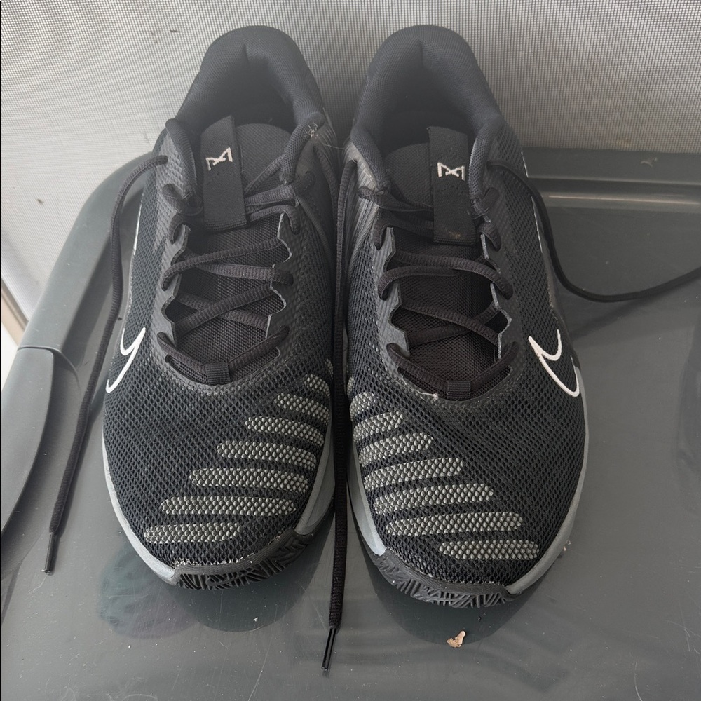 Nike Black Athletic Running Shoes with White Swoosh